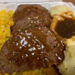 Curly's Meatloaf with gravy, corn & mashed potatoes